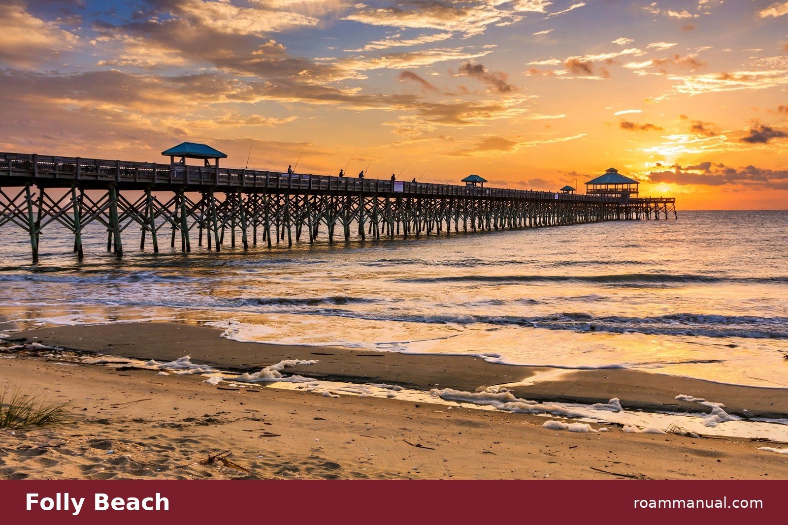 Folly Beach pier at sunset with waves and golden sky near Charleston