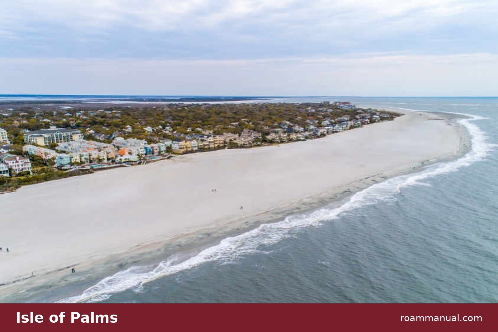 Aerial view of the wide Isle of Palms shoreline and beach houses near Charleston