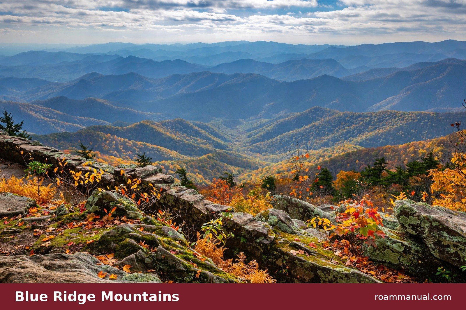 Blue Ridge Parkway overlook near Asheville with layered mountain ridges fading into blue haze
