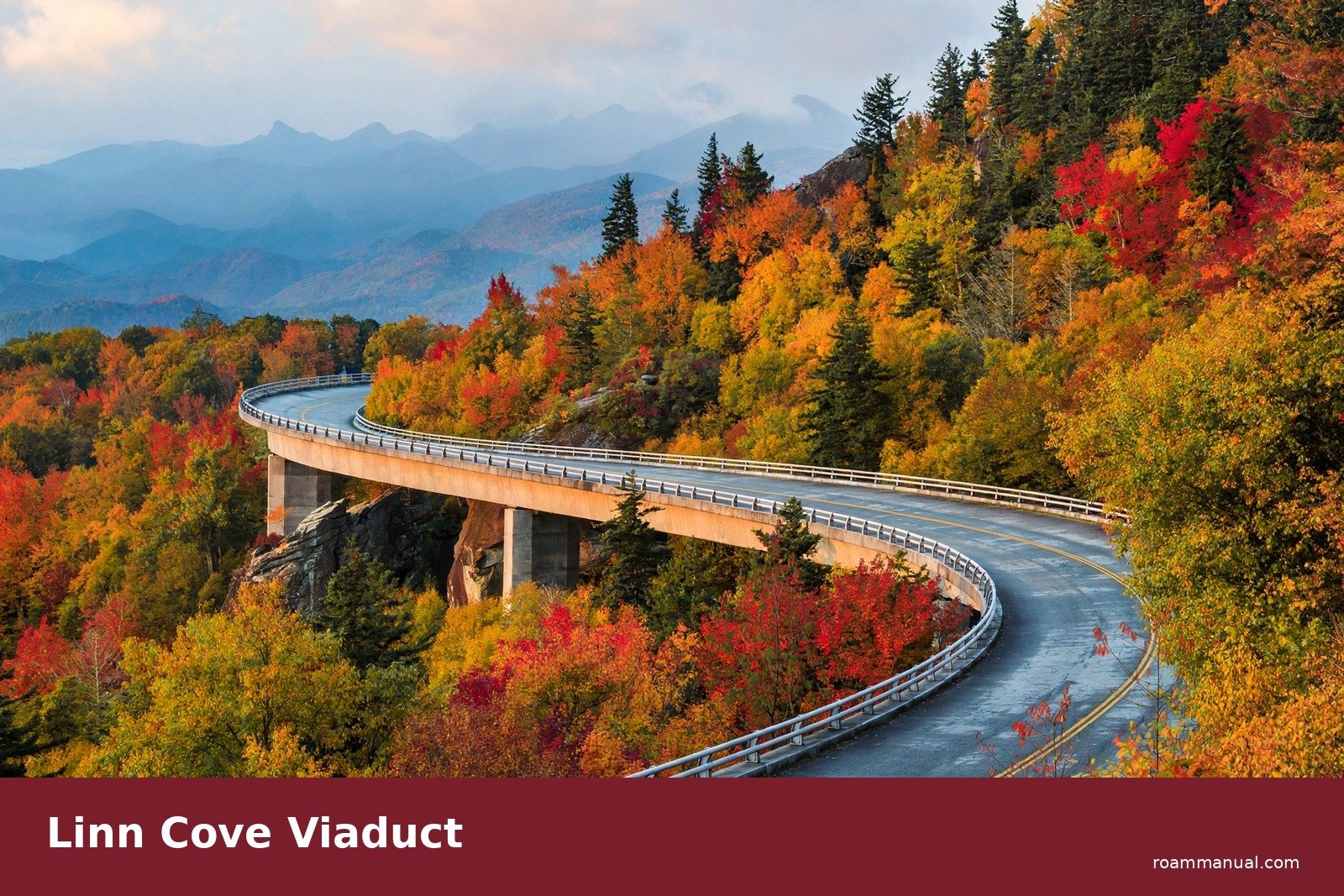 Linn Cove Viaduct curving around Grandfather Mountain with peak fall colors