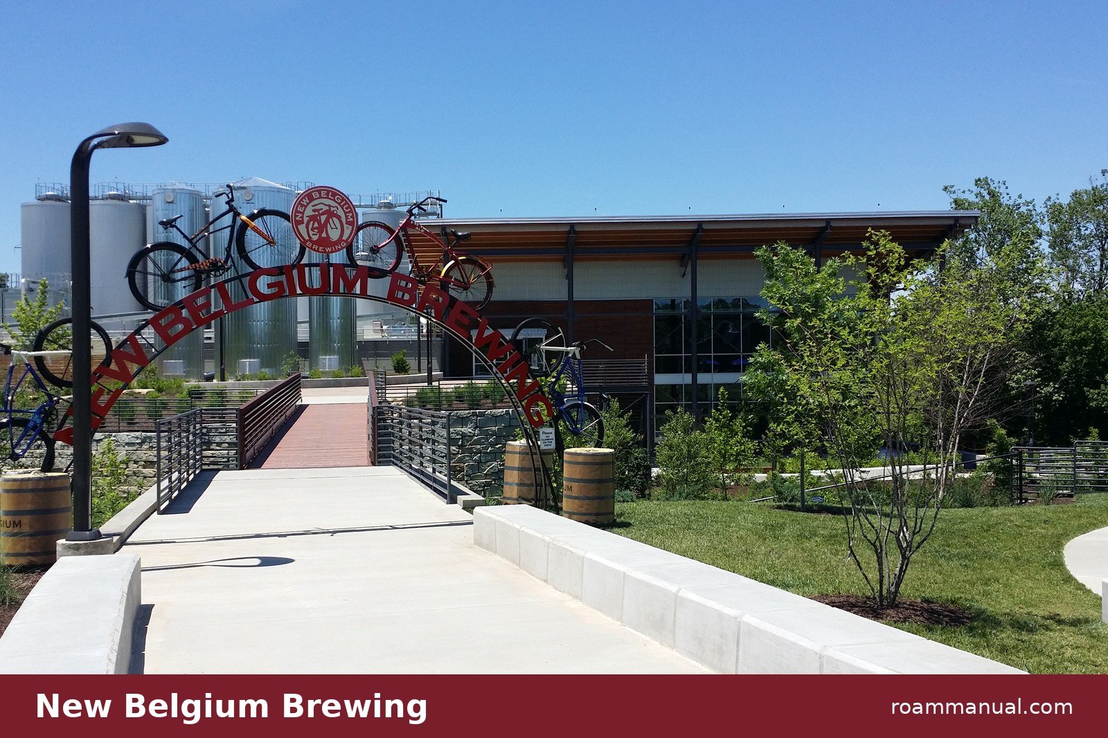 The bicycle arch entrance at New Belgium Brewing in Asheville, North Carolina, with the Liquid Center tasting room behind it
