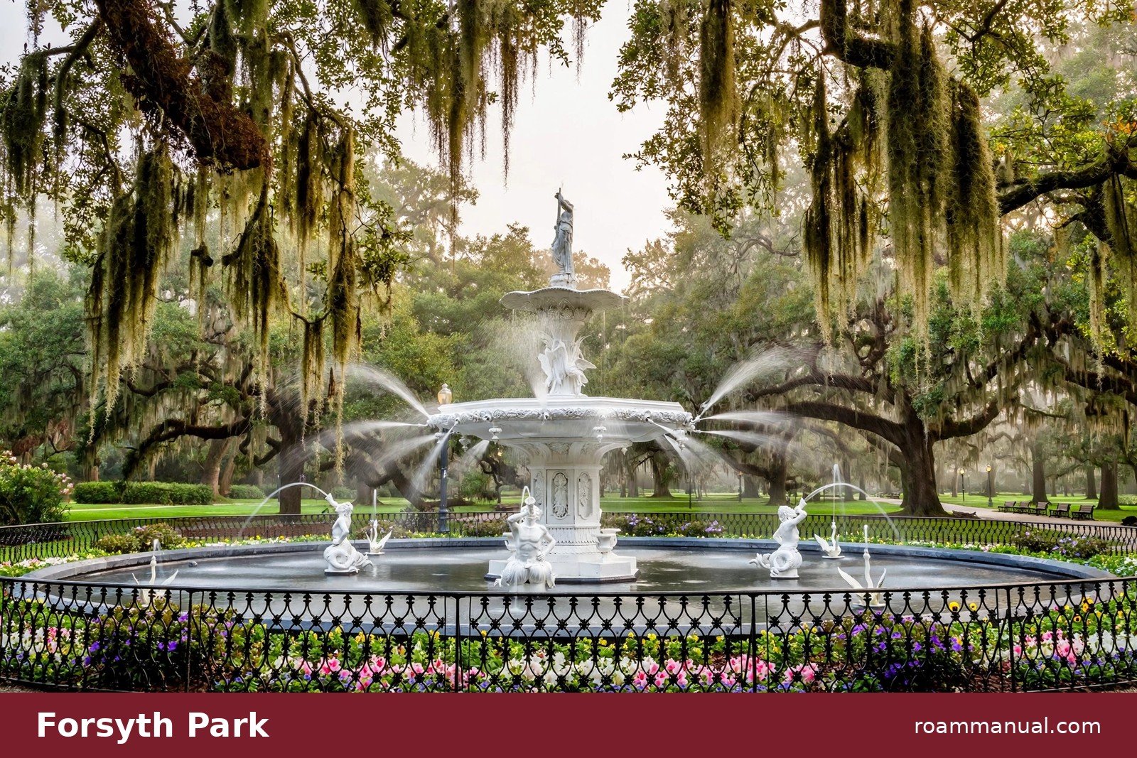 Forsyth Park's iconic fountain framed by live oaks in Savannah, Georgia