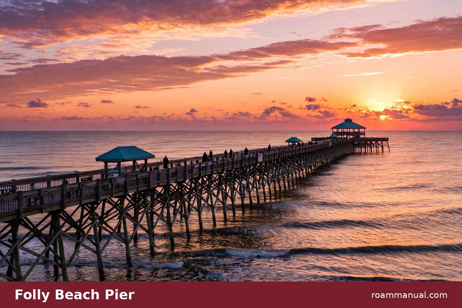Folly Beach pier stretching into the Atlantic at sunset near Charleston, South Carolina